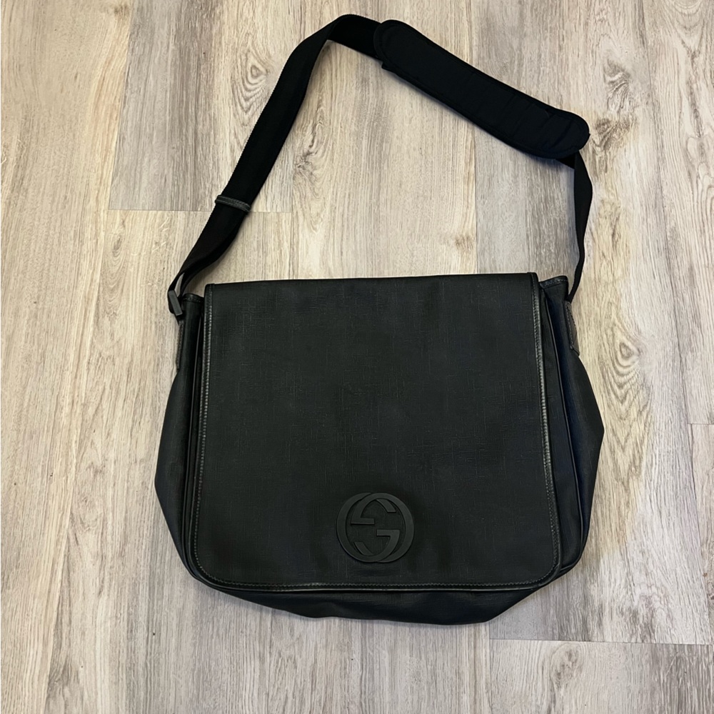 Black Gucci messenger bag